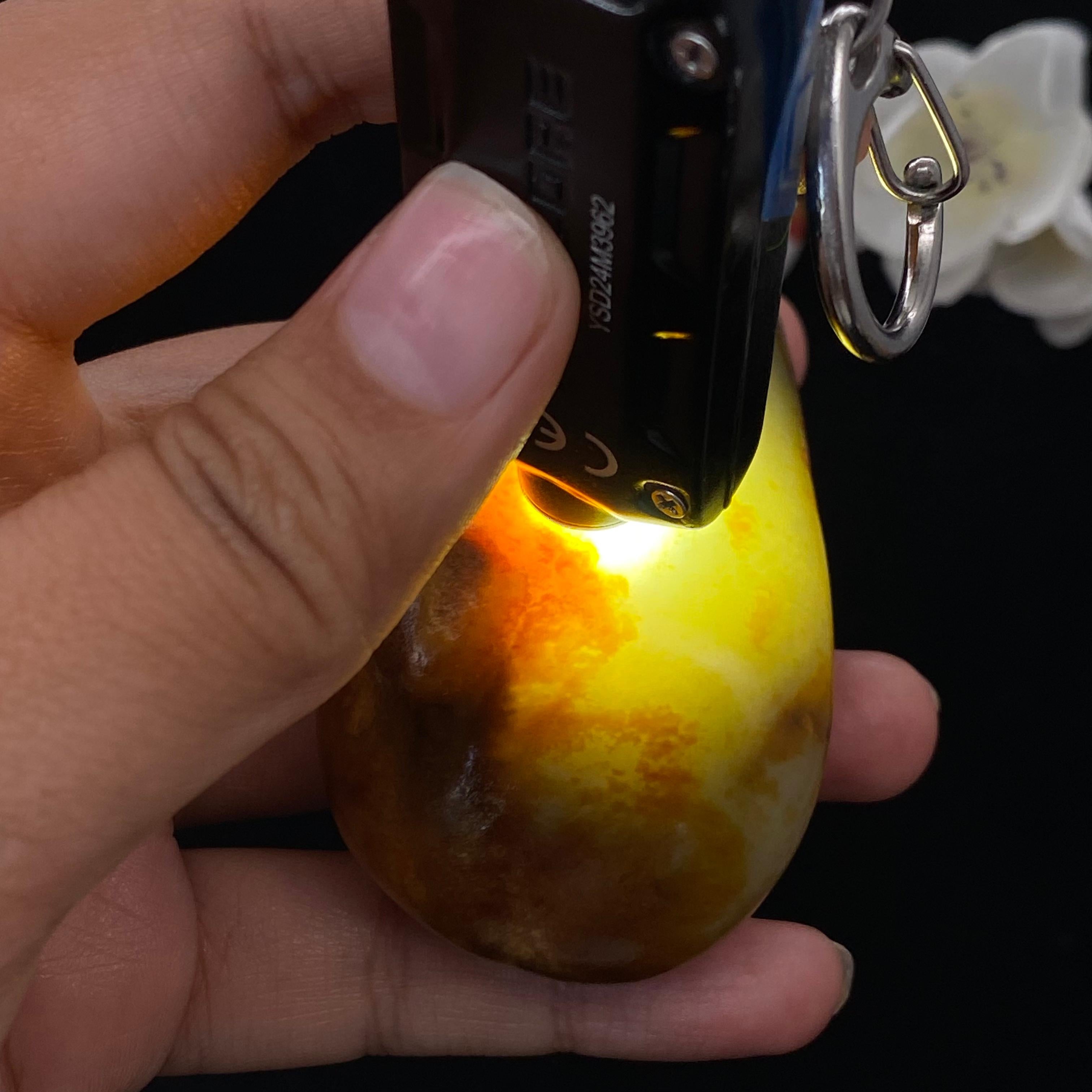 和田玉聚黄皮籽料手把件（144.1g）
