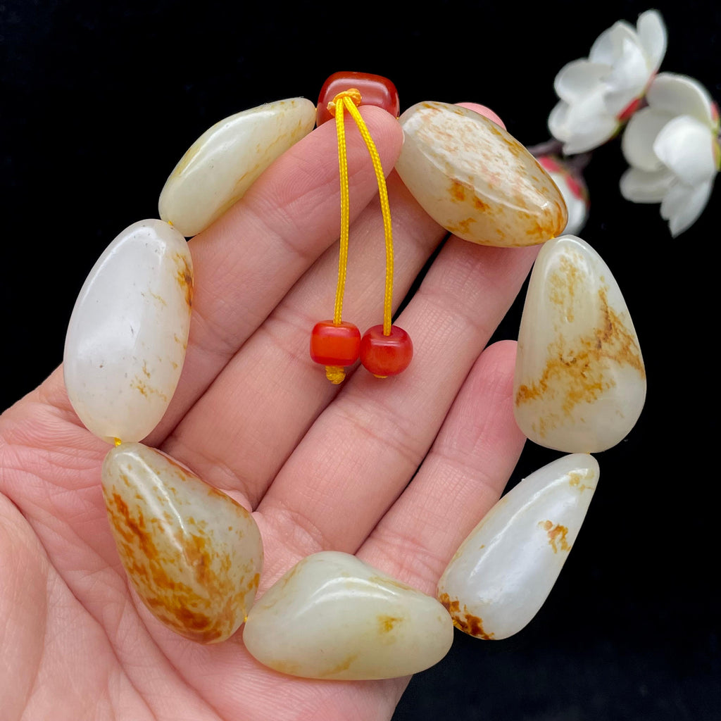 和田玉洒红皮籽料【精品手串】（72.4g）