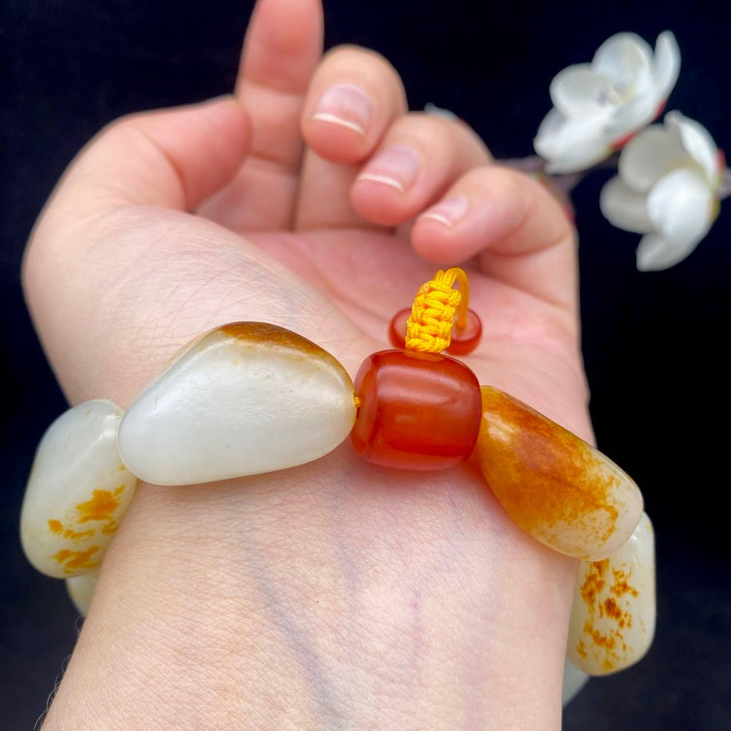 和田玉洒红皮籽料【精品手串】（75.9g）