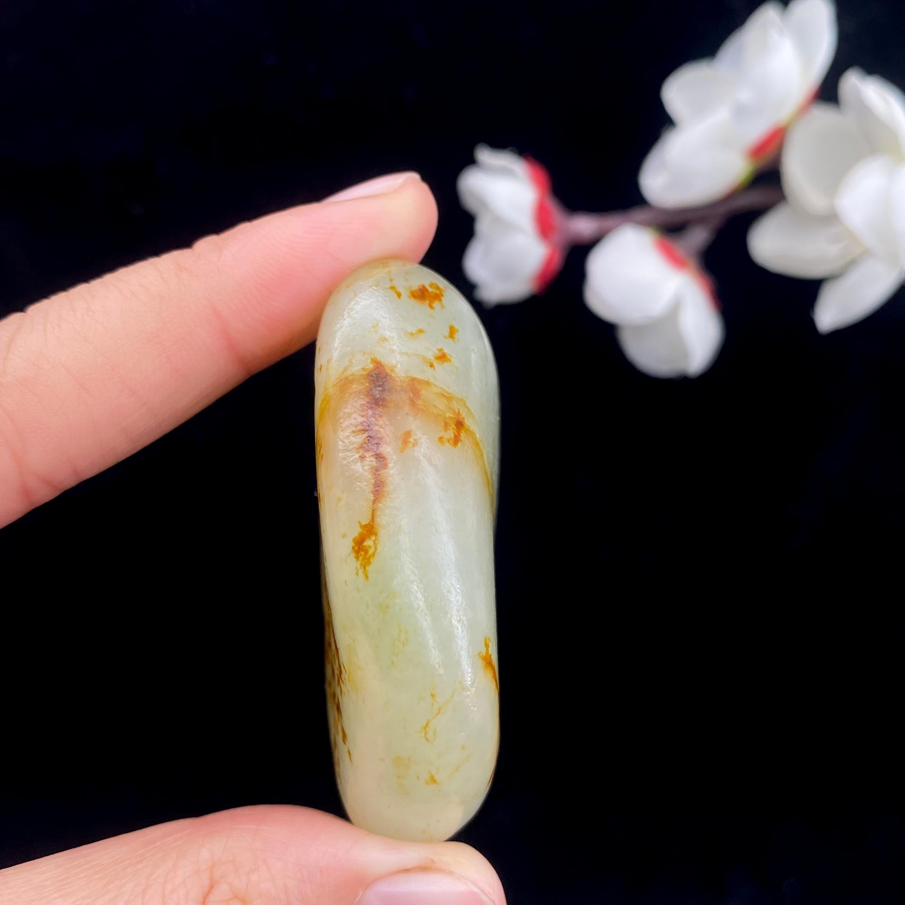 和田玉洒红皮籽料原石（57.3g）