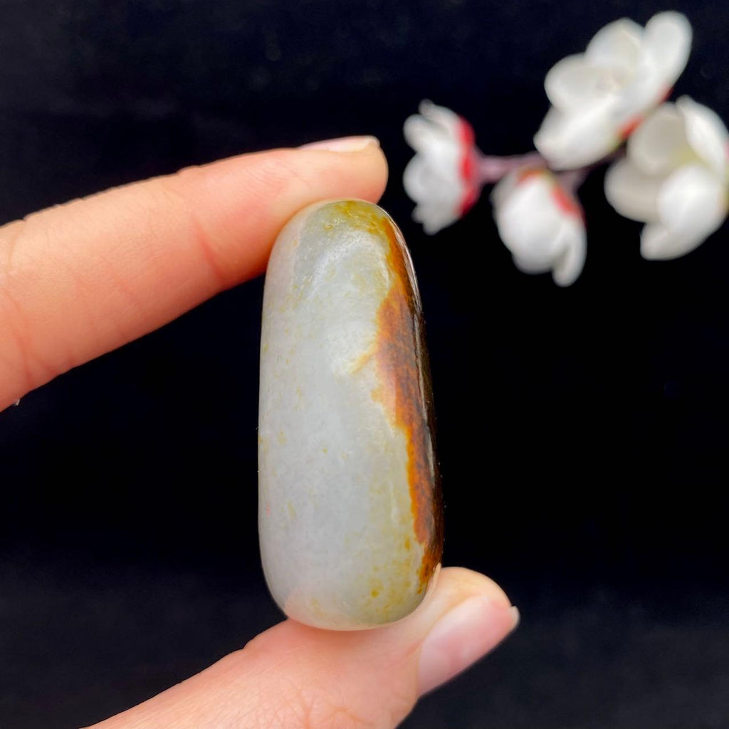 和田玉聚红皮青花籽料原石（64.6g）