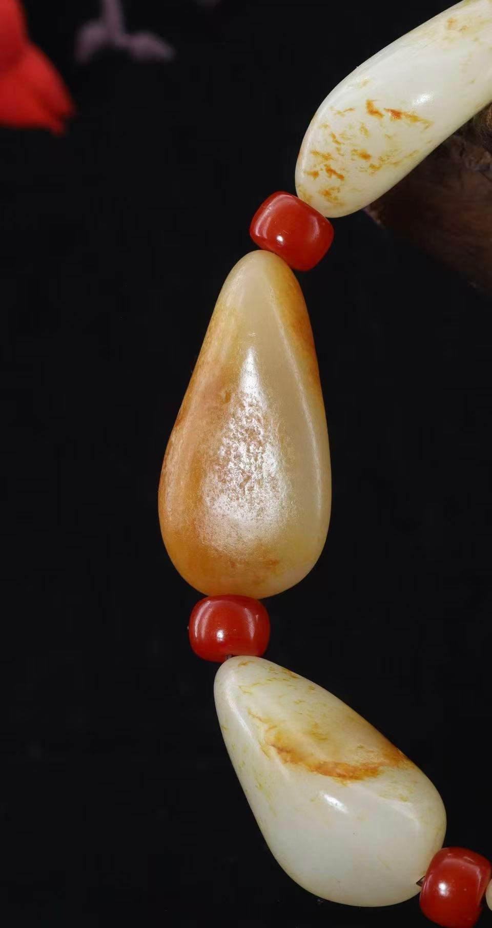 和田玉聚黄皮籽料【精品手串】（94.2g）