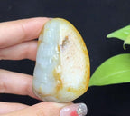 新疆和田玉红皮白肉籽料观音（76.3g）