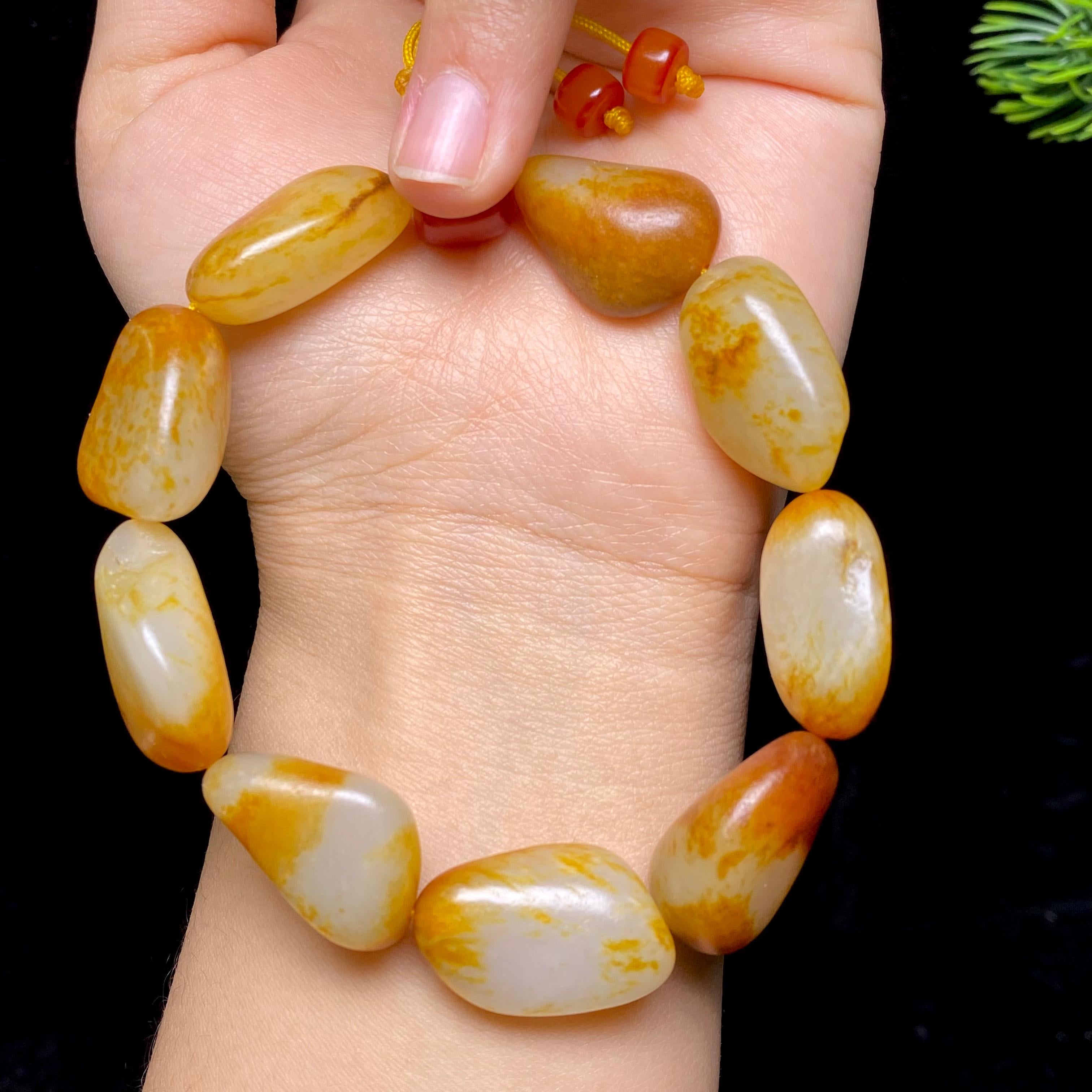 和田玉红皮籽料手串（56.6g）