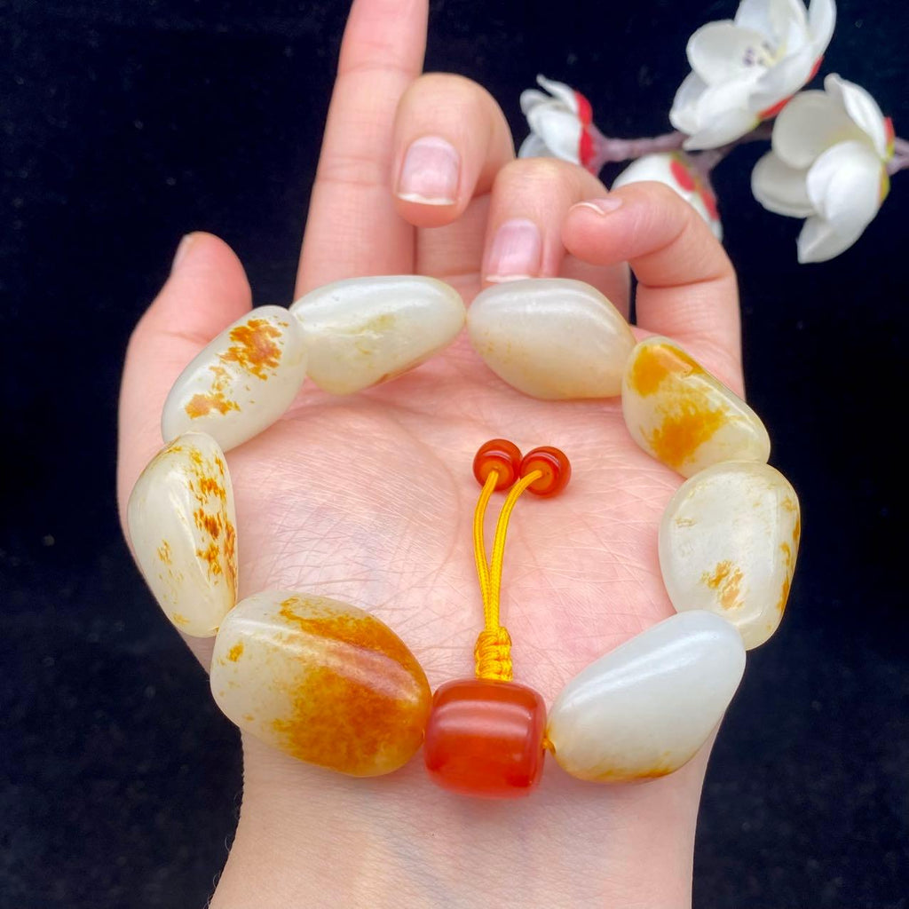 和田玉洒红皮籽料【精品手串】（75.9g）