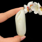 和田玉洒金皮籽料手把件（121.4g）