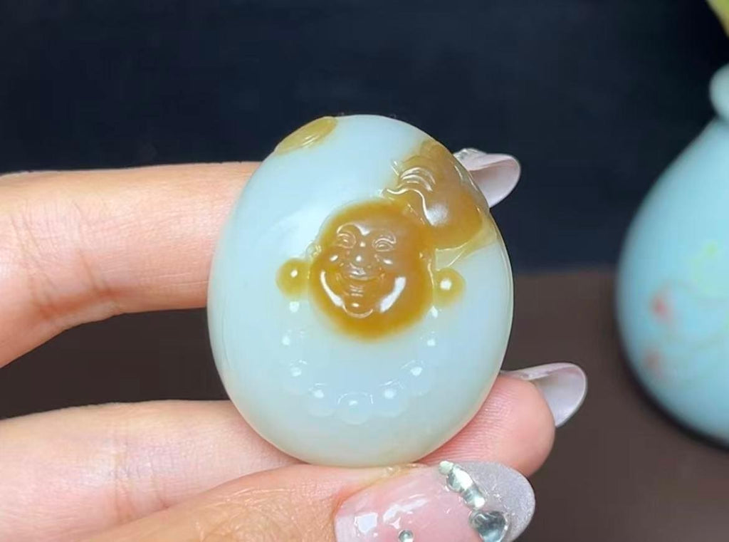 精品新疆和田玉且末糖羊脂玉佛公（32.0g）