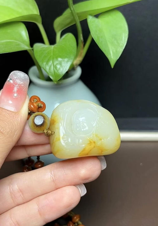 新疆和田玉籽料宝宝佛（58.7g）