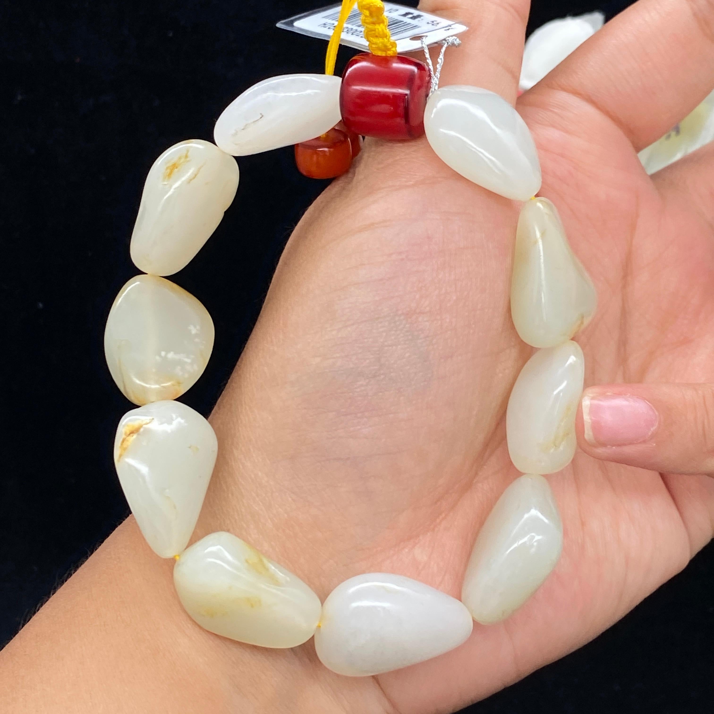 秒杀和田玉-白玉带黄皮籽料【精品手串】H2603300281（56.7g）