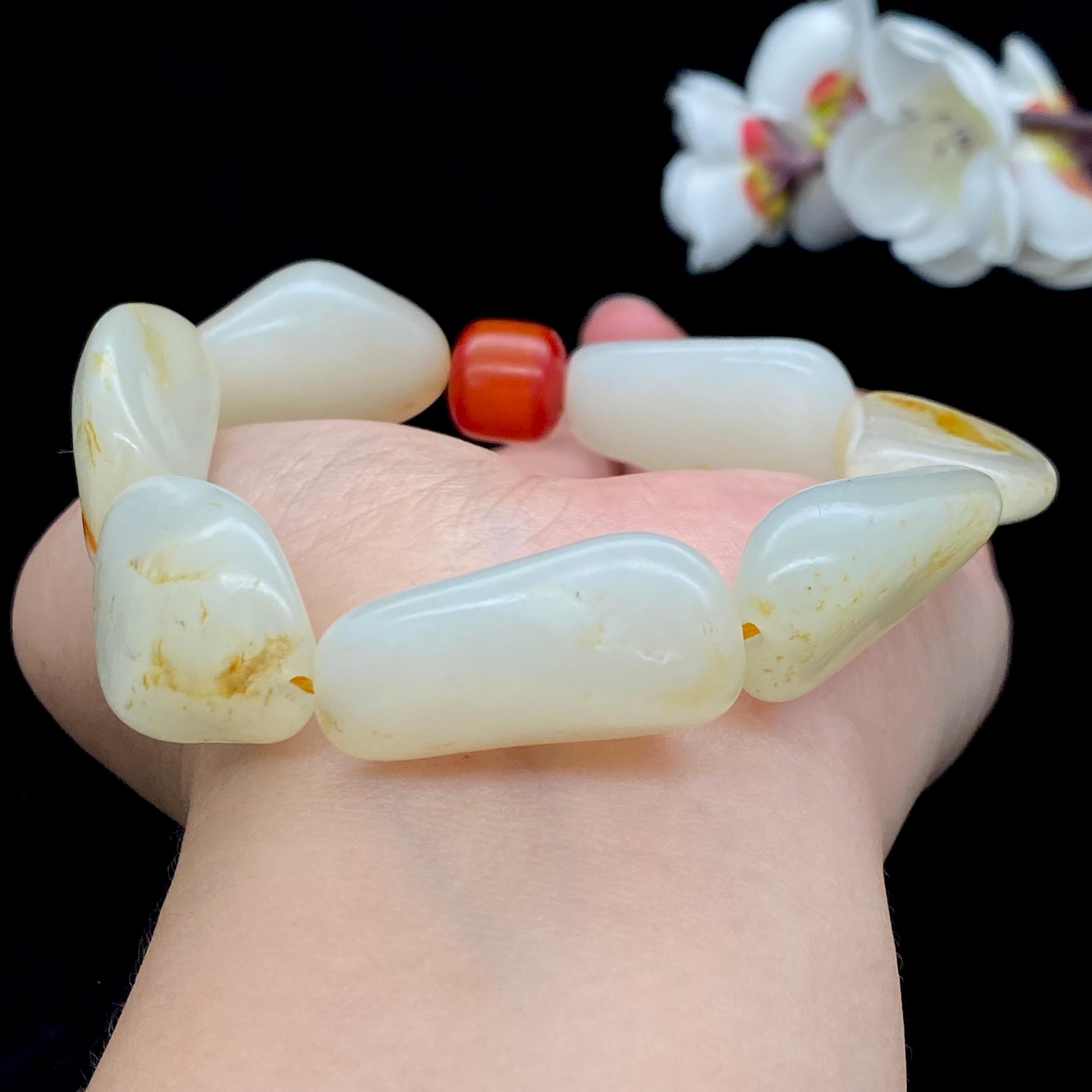 和田玉洒金皮籽料【精品手串】（80.8g）