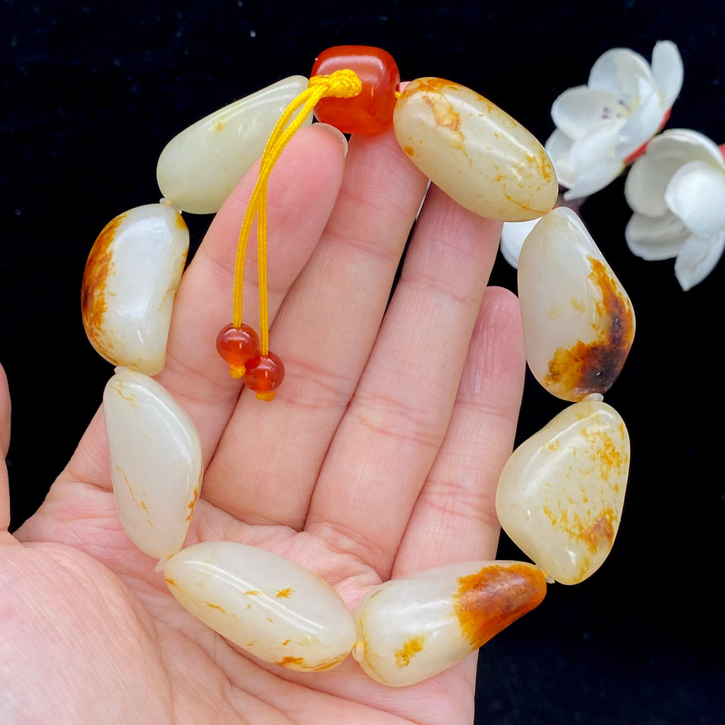 和田玉洒红皮籽料【精品手串】（74.3g）