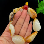 和田玉聚黄皮籽料【精品手串】（77.2g）
