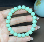 稀少和田玉黑羊洞料薄荷绿老型珠手串（34.1g）