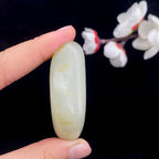 和田玉洒红皮籽料原石（57.3g）