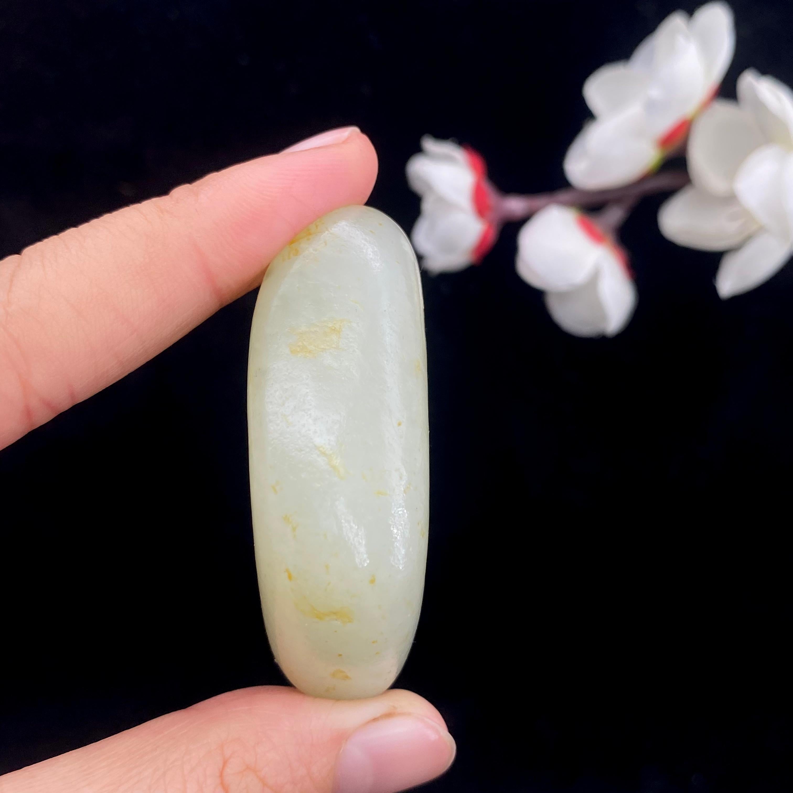 和田玉洒红皮籽料原石（57.3g）