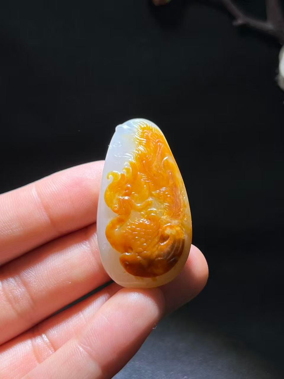和田玉籽料凤穿牡丹（19.7g）