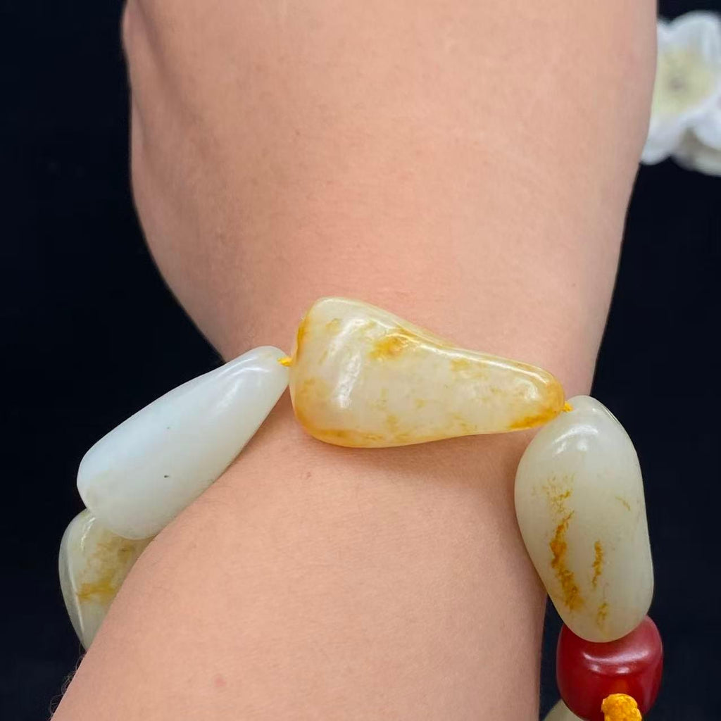 和田玉洒金皮籽料【精品手串】（65.3g）