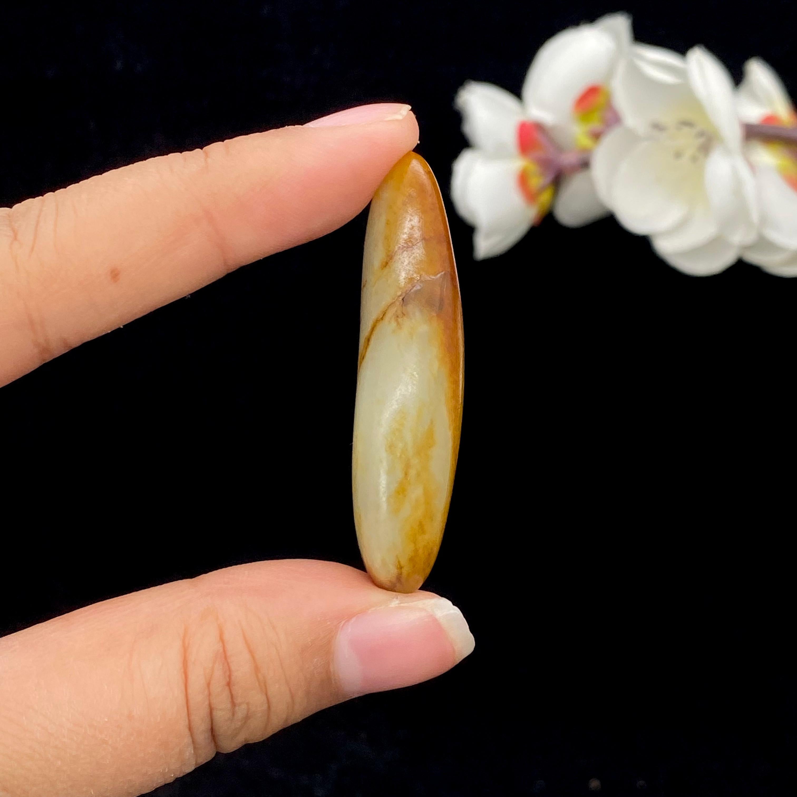 和田玉聚黄皮籽料挂件（18.8g）