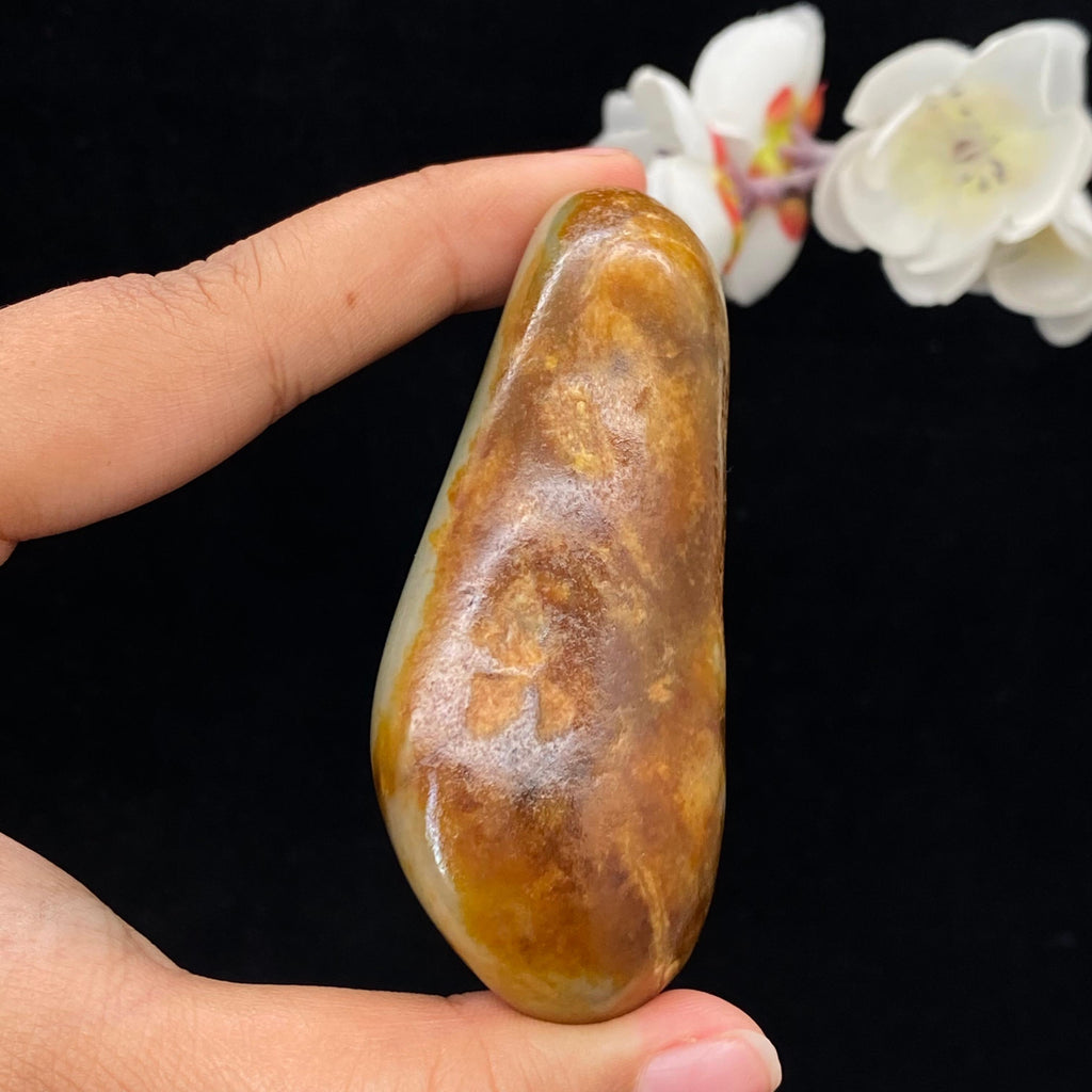 和田玉聚黄皮籽料手把件（144.1g）