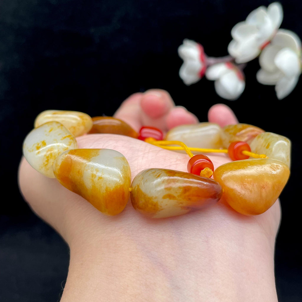 和田玉红皮籽料【精品手串】（55.2g）