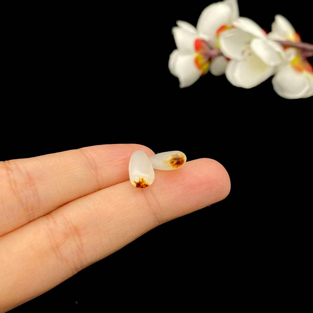 和田玉聚黄皮籽料戒面籽（1.7g）