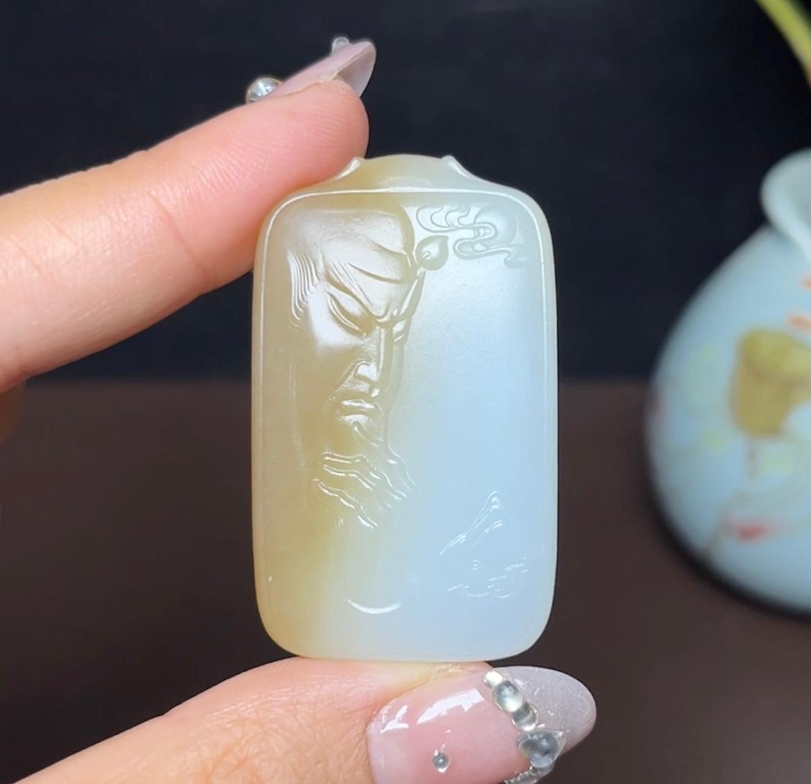 新疆和田玉且末糖白关公（23.8g）