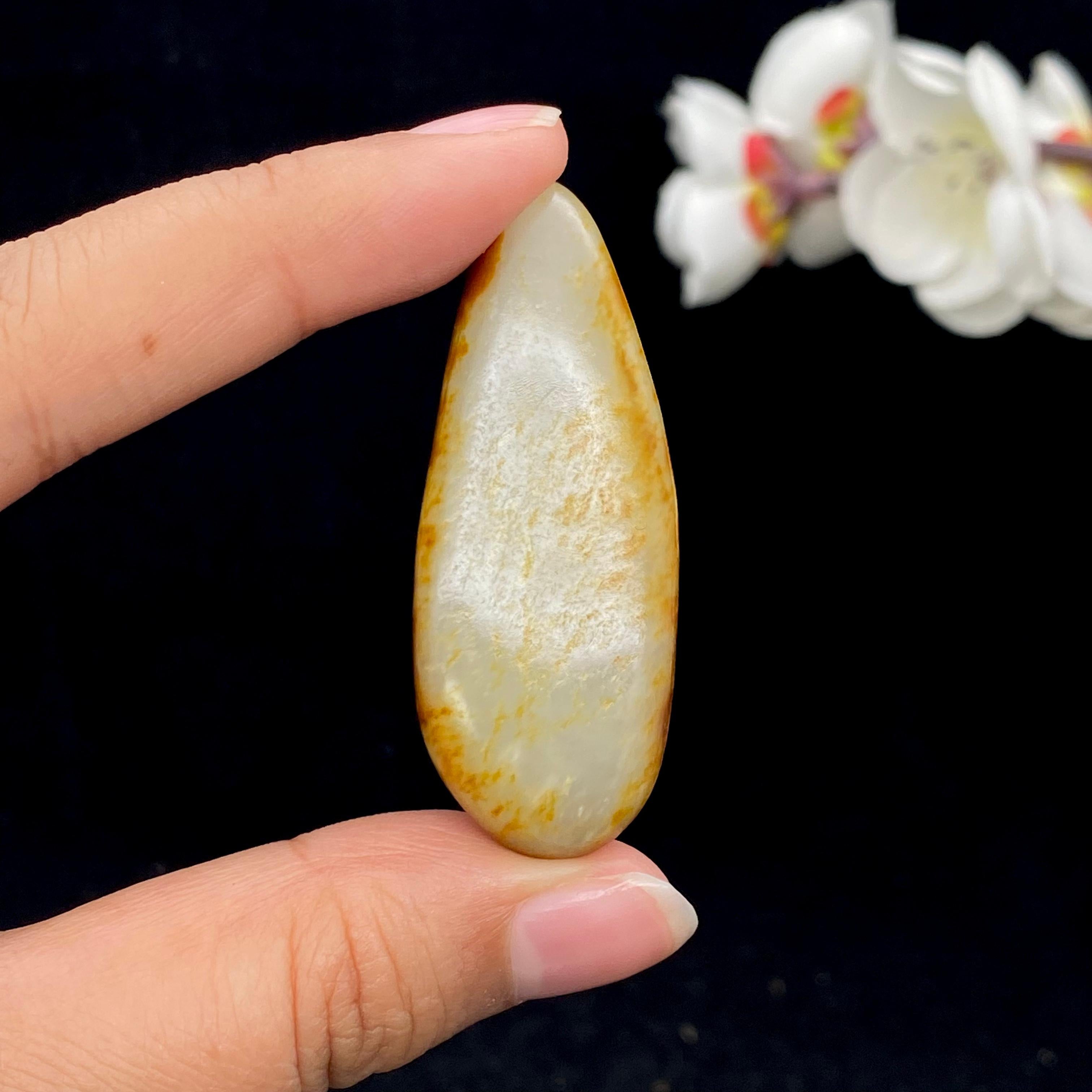 和田玉聚黄皮籽料挂件（22.7g）