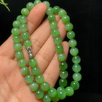 高品质和田碧玉粉绿猫眼项链（43.7g）