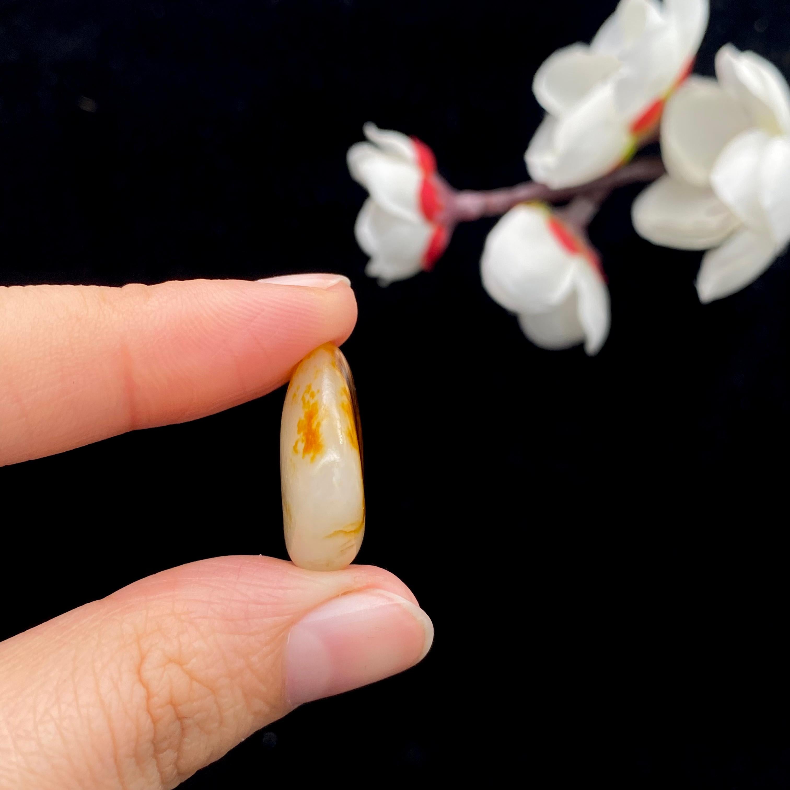 和田玉聚红皮籽料原石（4.5g）