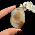 和田玉聚红皮籽料挂件（56.7g）