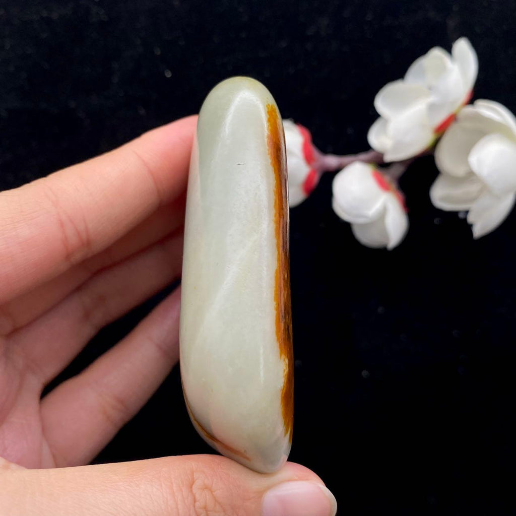 和田玉聚黄皮籽料手把件（123.9g）
