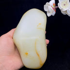 和田玉洒红皮籽料原石（902.3g）