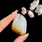 和田玉聚红皮籽料原石（33.9g）