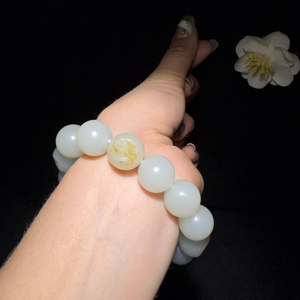 和田玉籽料圆珠手串（62.6g）