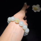 和田玉籽料圆珠手串（62.6g）