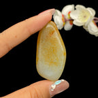 和田玉聚黄皮青花底籽料挂件（34.1g）