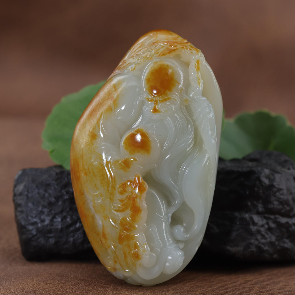 和田玉洒金皮寿星题材随形手把件（181.5g）