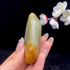 和田玉聚黄皮籽料手把件（94g）