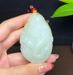 新疆和田玉籽料秋梨皮羊脂玉封侯拜相手把件（133.9g）