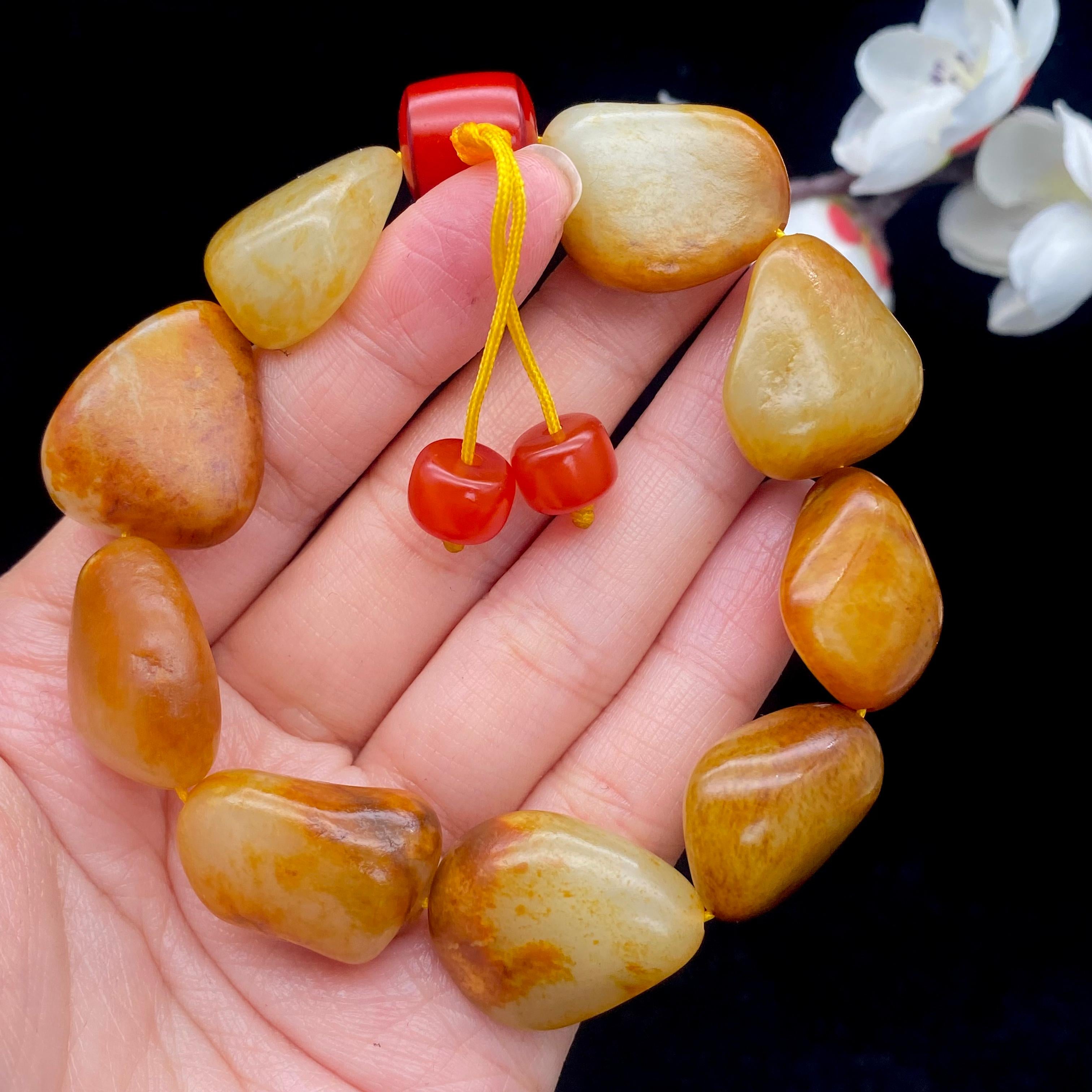和田玉聚红皮籽料【精品手串】（70g）