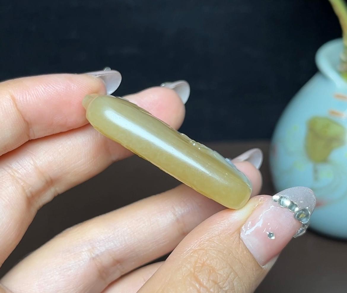 新疆和田玉且末糖白关公（23.8g）