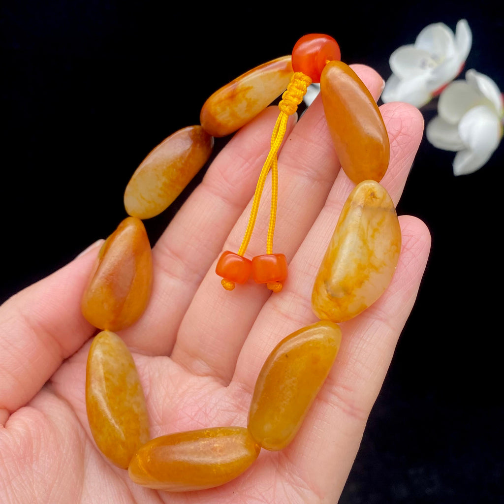 和田玉满黄皮籽料【精品手串】（43.4g）