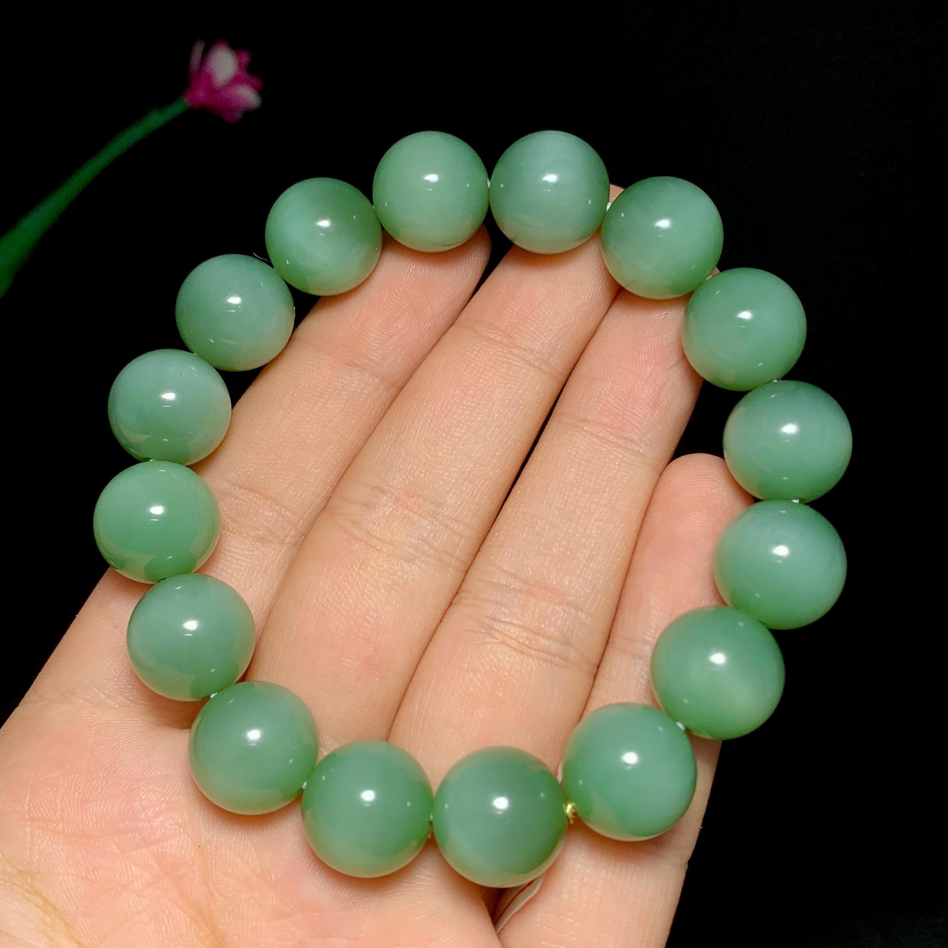 高品质和田碧玉猫眼圆珠手串（53.2g）