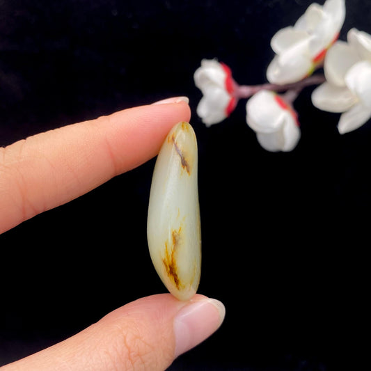 和田玉黄皮籽料原石（21.8g）