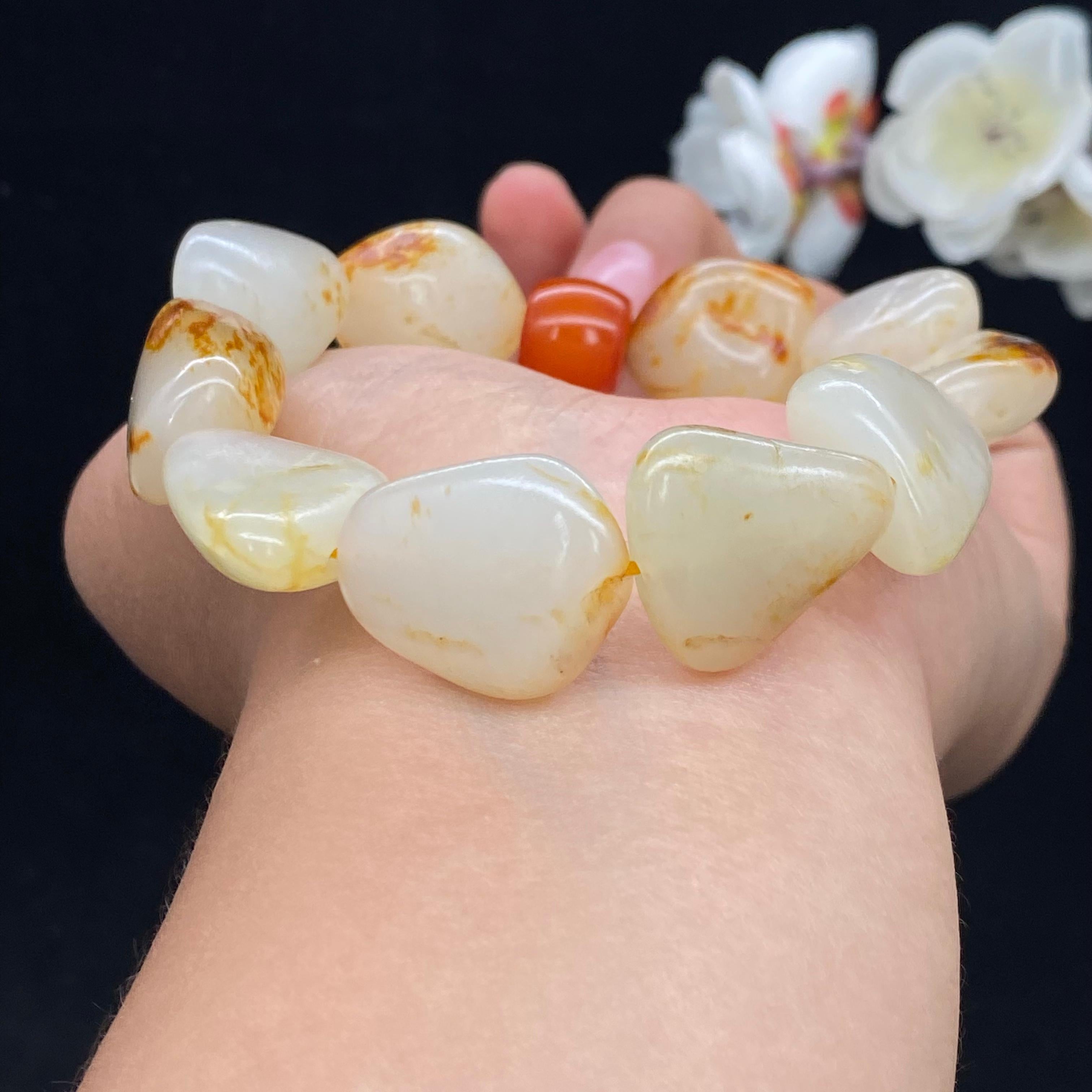 和田玉洒红皮籽料【精品手串】（64.2g）