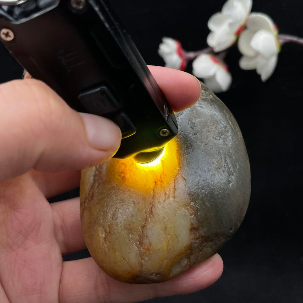 和田玉聚黄皮籽料手把件（200g）