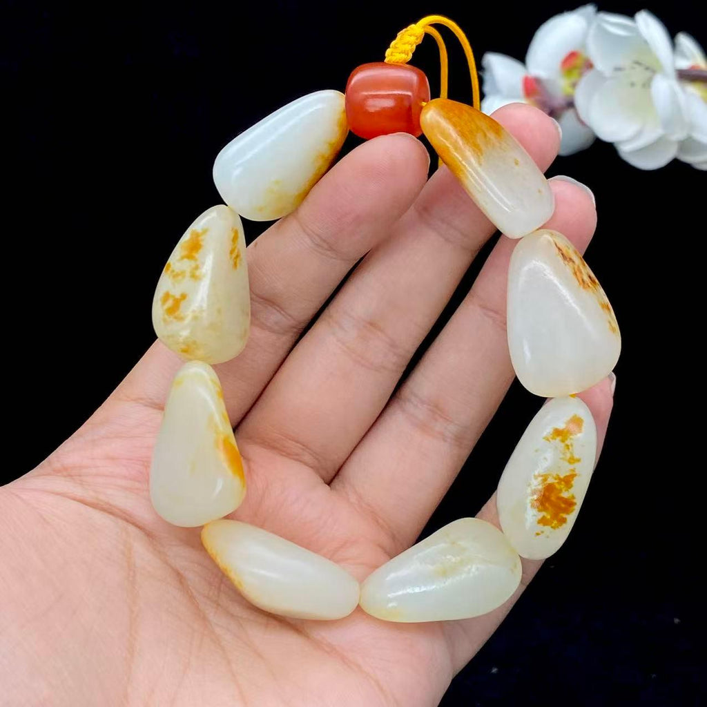 和田玉洒红皮籽料【精品手串】（76g）