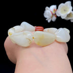 和田玉白玉带黄皮籽料【精品手串】（54.1g）
