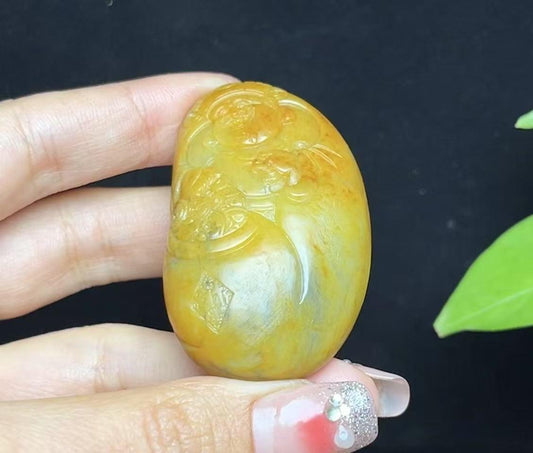 新疆和田玉籽料红沁财神（53.3g）