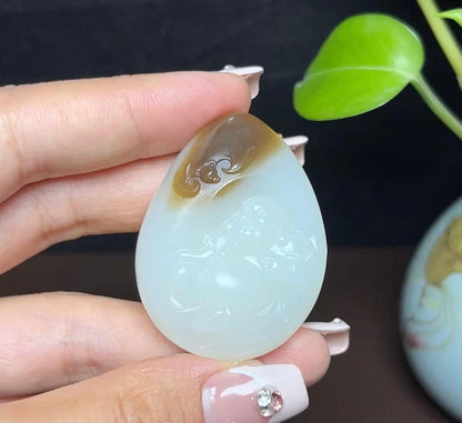 新疆和田玉且末糖羊脂玉佛公（40.3g）